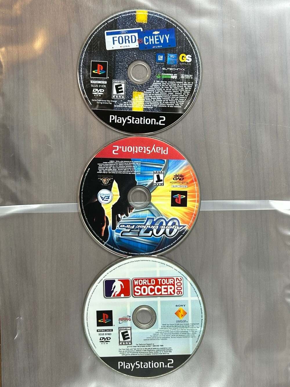 PS2 Lot 3 Ford vs Chevy 007 Agent Under Fire World Tour Soccer 2006 Untested